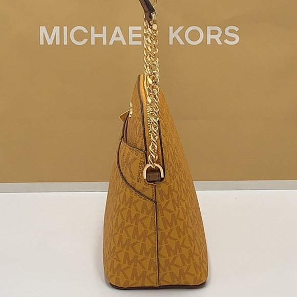Michael Kors Medium Dome Xcross Xbody Bag
Color: Marigold Multi - Picture 4 of 15